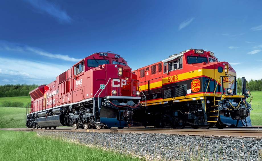 A pre-merger photo of two locomotives.