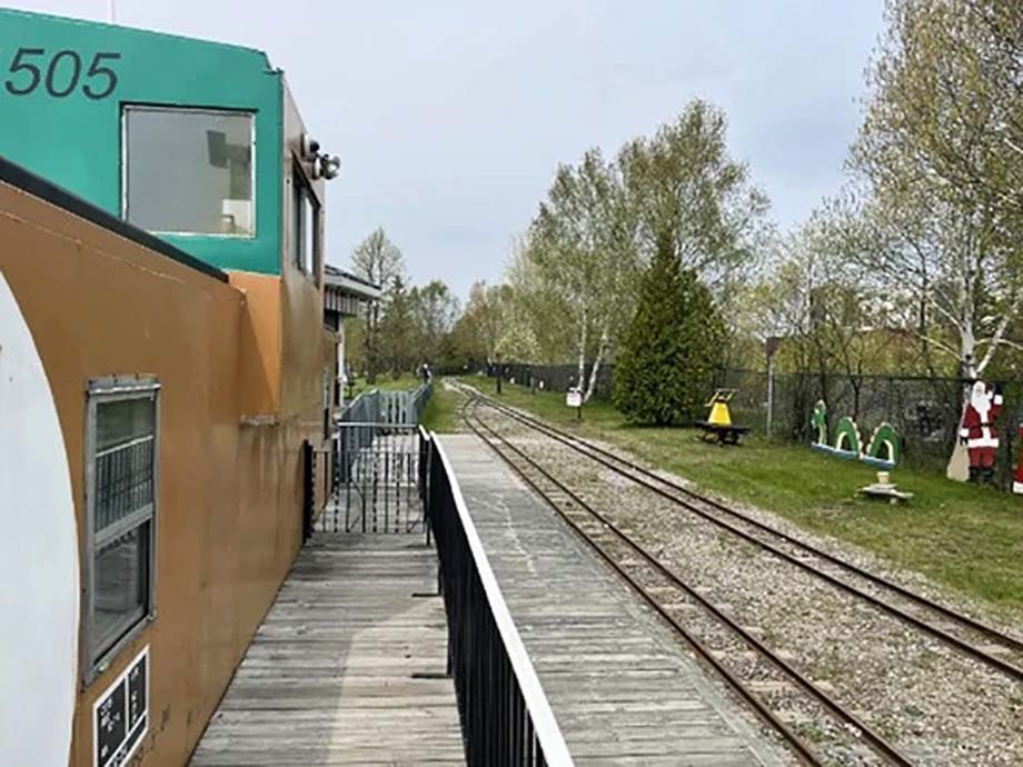 An ex-CP Rail caboose and the miniature railway tracks.