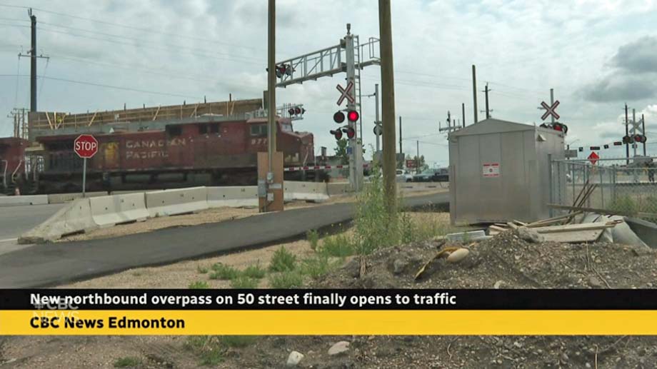 A CPKC train at the 50th street crossing.