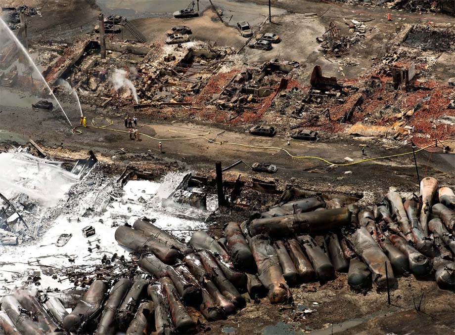 Derailed cars and destroyed buildings the day after the disaster.