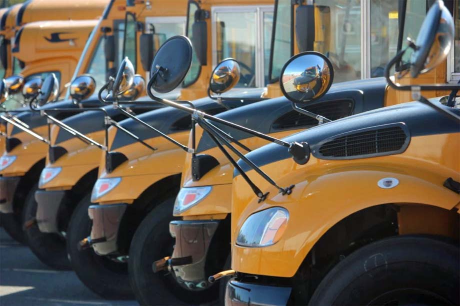 A row of school busses.