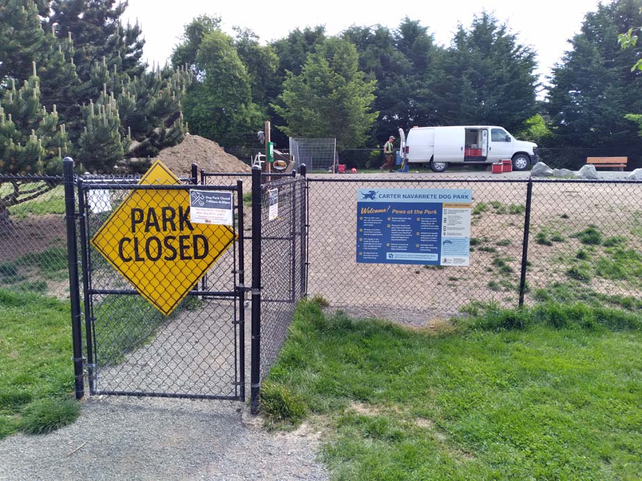 Closed sign on the dog park gate