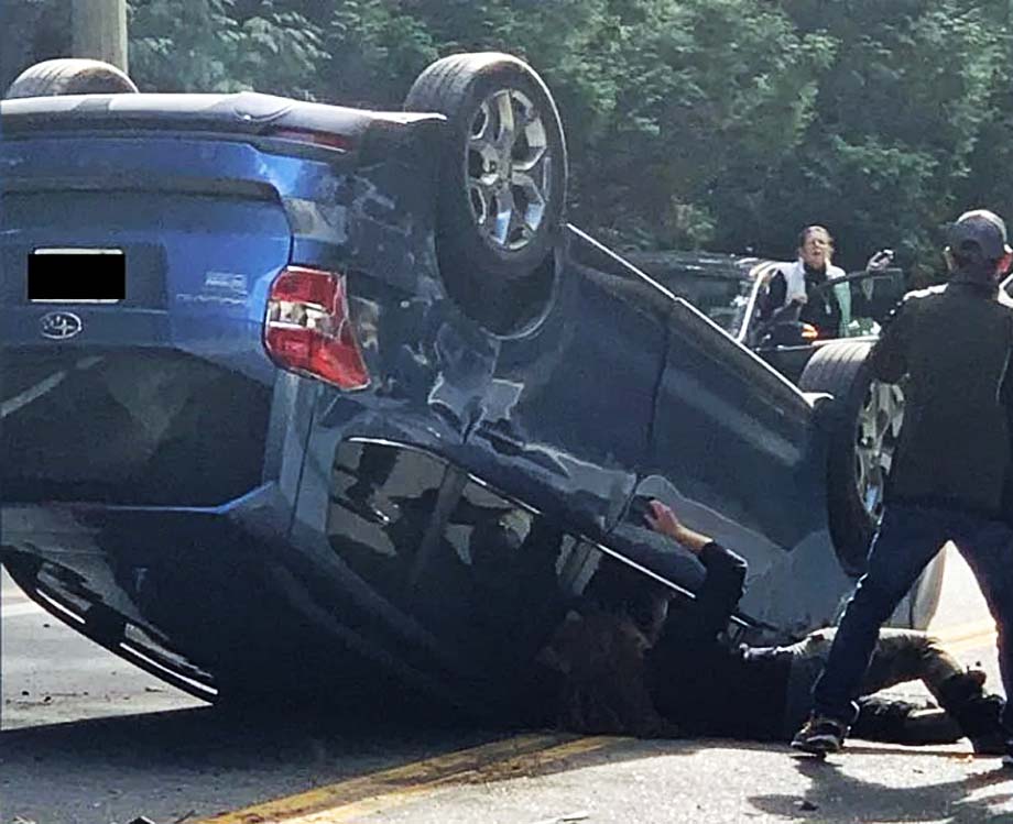 The rolled over vehicle.