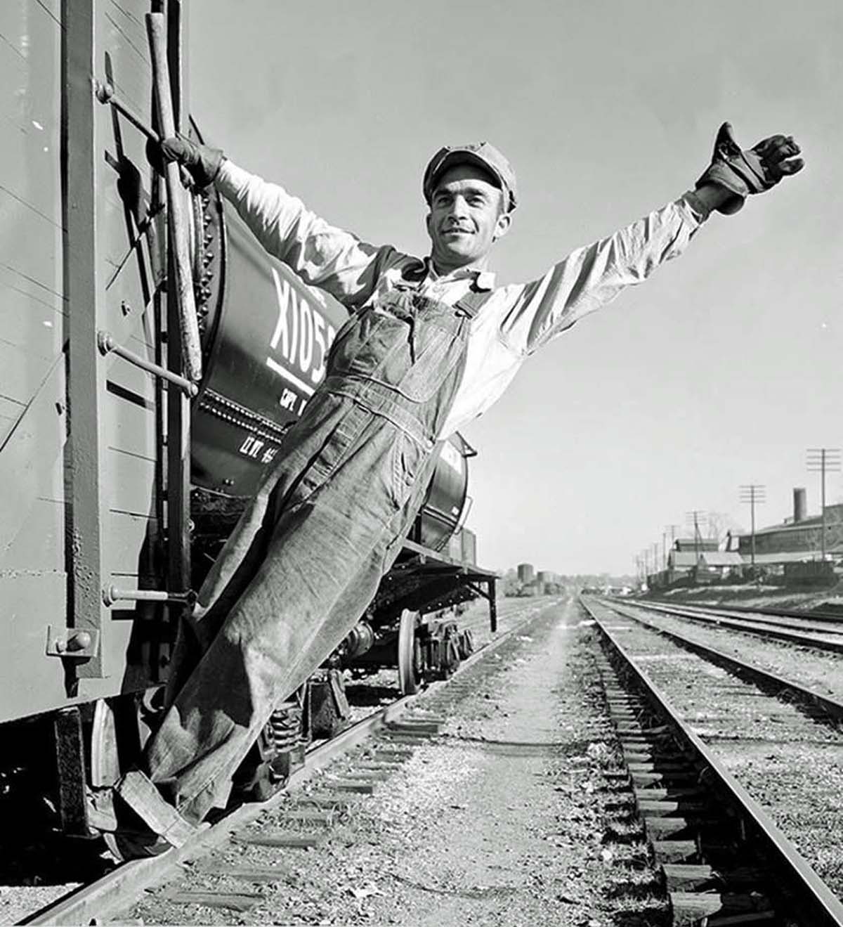 A railroad brakeman with his club.