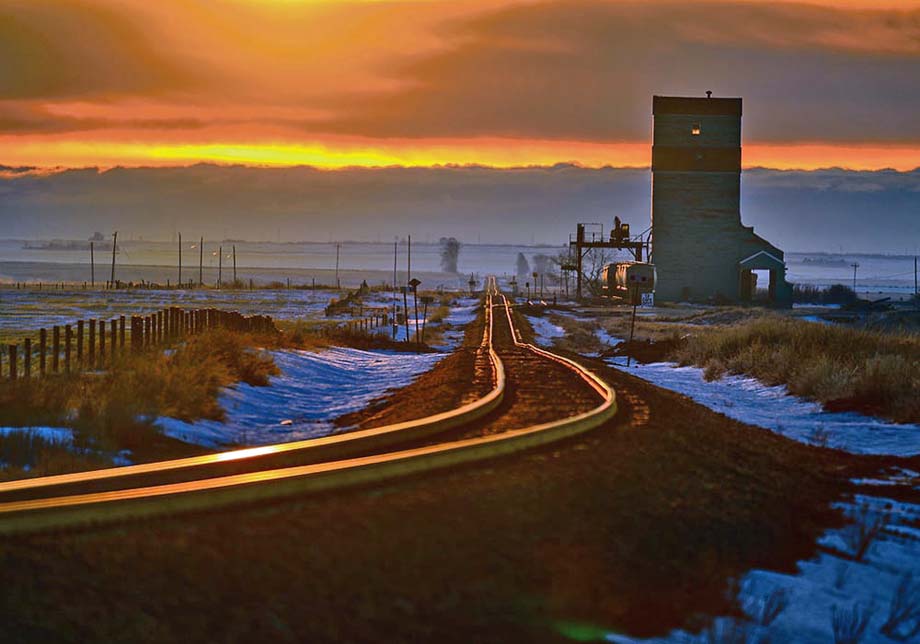 A lonely antique prairie grain elevator.