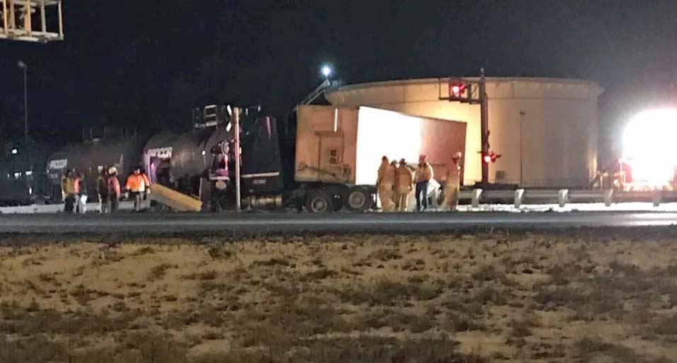 The aftermath of a crash involving a semi-truck and a CP train.