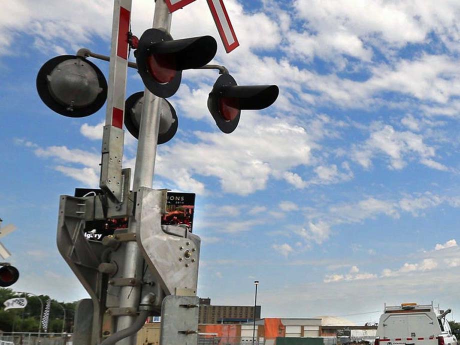 A grade crossing warning signal and barrier.