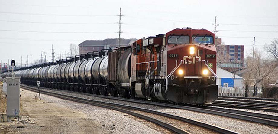 A crude oil train arrives at Bensenville Yard.