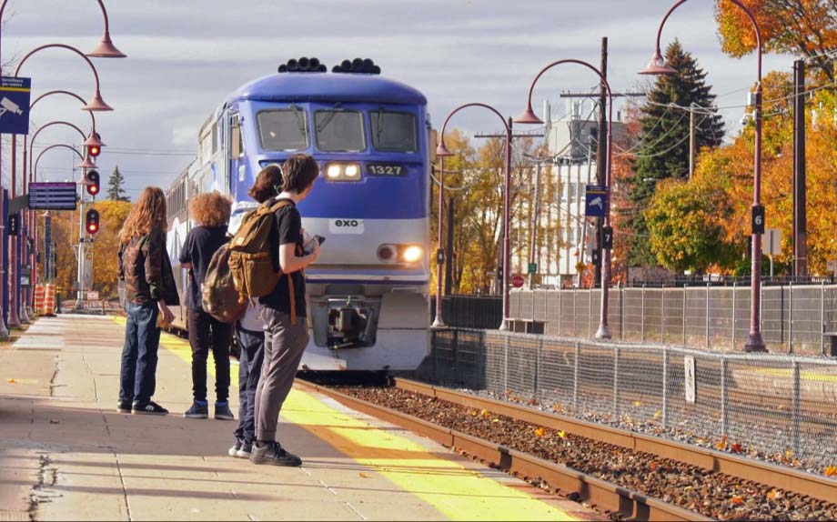 Commuters wait for an EXO train.